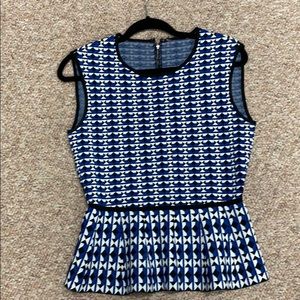 Blue , black and white printed top.